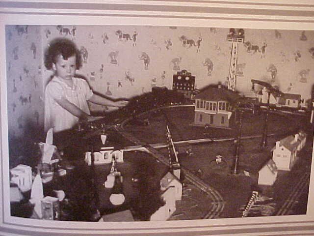 vintage Lionel train layout 
 with Japanese plaster village houses photo