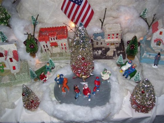 Christmas village putz houses with Barclay 
figures vintage