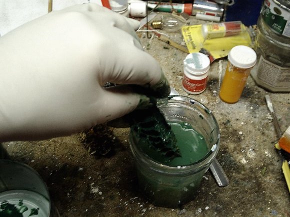 Restoring trees on cardboard Christmas village 
houses