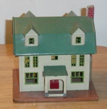 This 'Lackie' from Ted Althof's pages is a cardboard reproduction of a  tinplate Lionel  house.