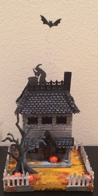 widow's walk house with bat, witch on roof.jpg