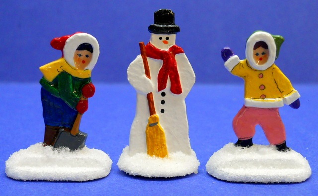 boy and girl "flatties are 1 3/6" tall...snowman "flattie" is 1 3/8" tall...