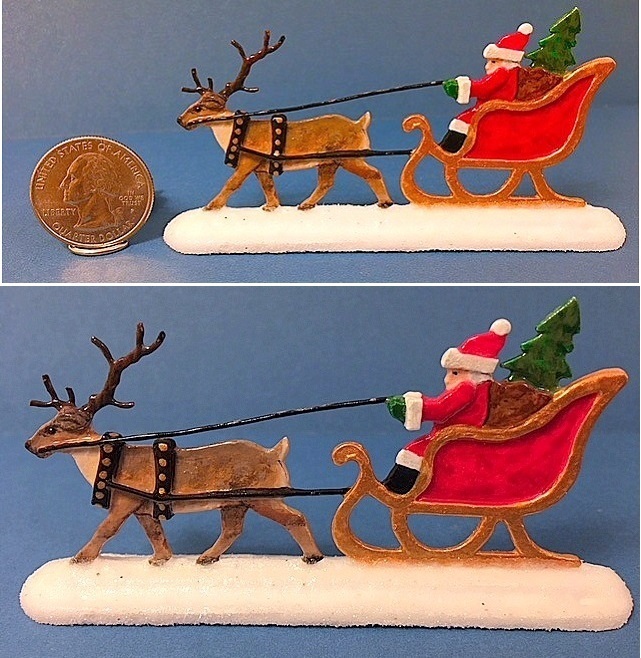 caribou sleigh santa finished with quarter for size.jpg