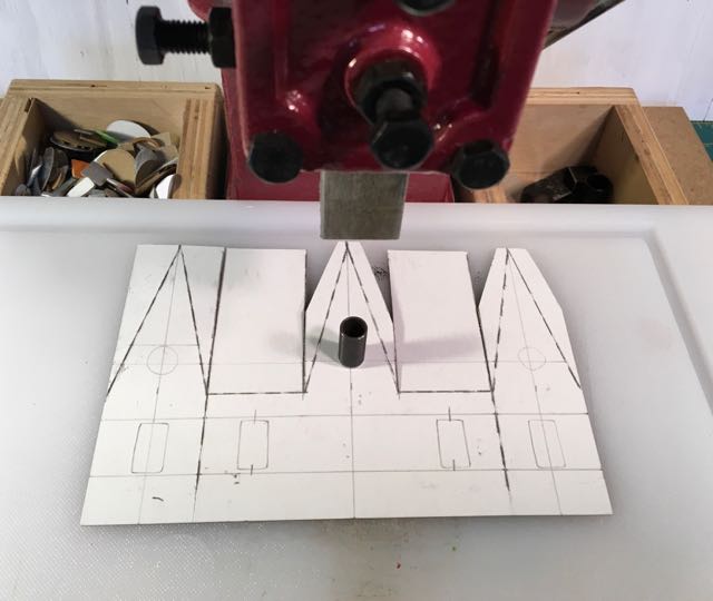 Arbor press with the cutting board and die in place ready for cutting