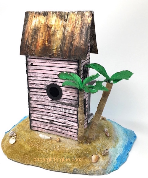 Back view pink sea worn beach putz house with palm trees paperglitterglue.jpeg