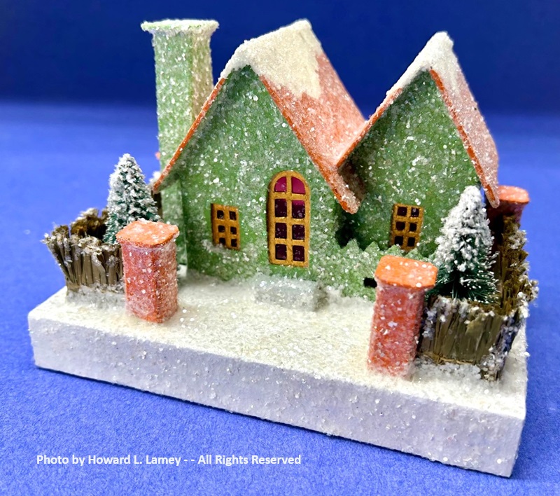 green orange house raffia fence.jpg