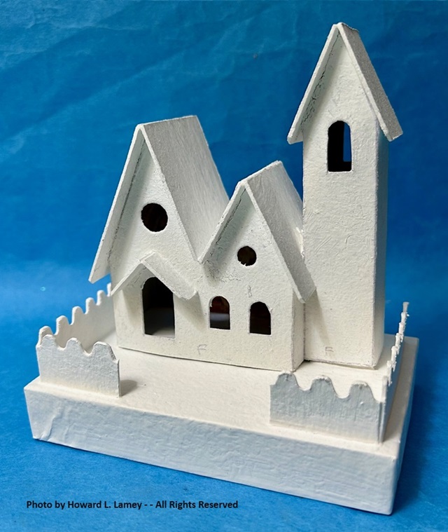 my version with one coat of primer...I added the classic scallop top fence detail...