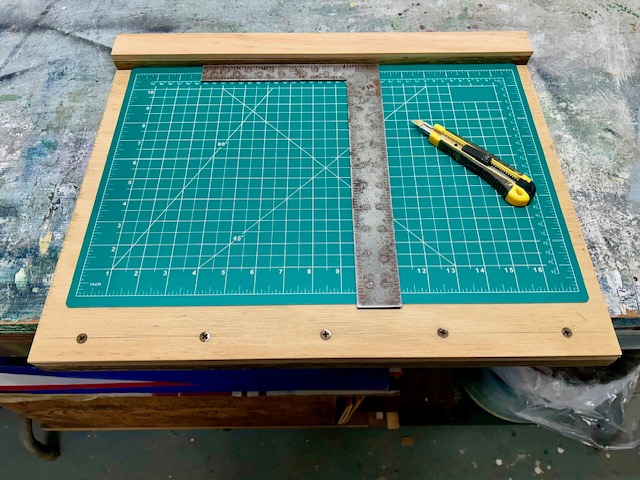 cardboard and paper cutting board.jpg